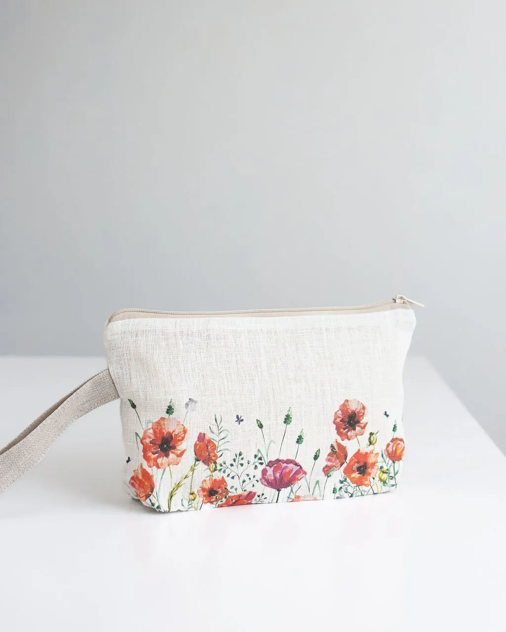 Poppy print wristlet pouch from linen fabric